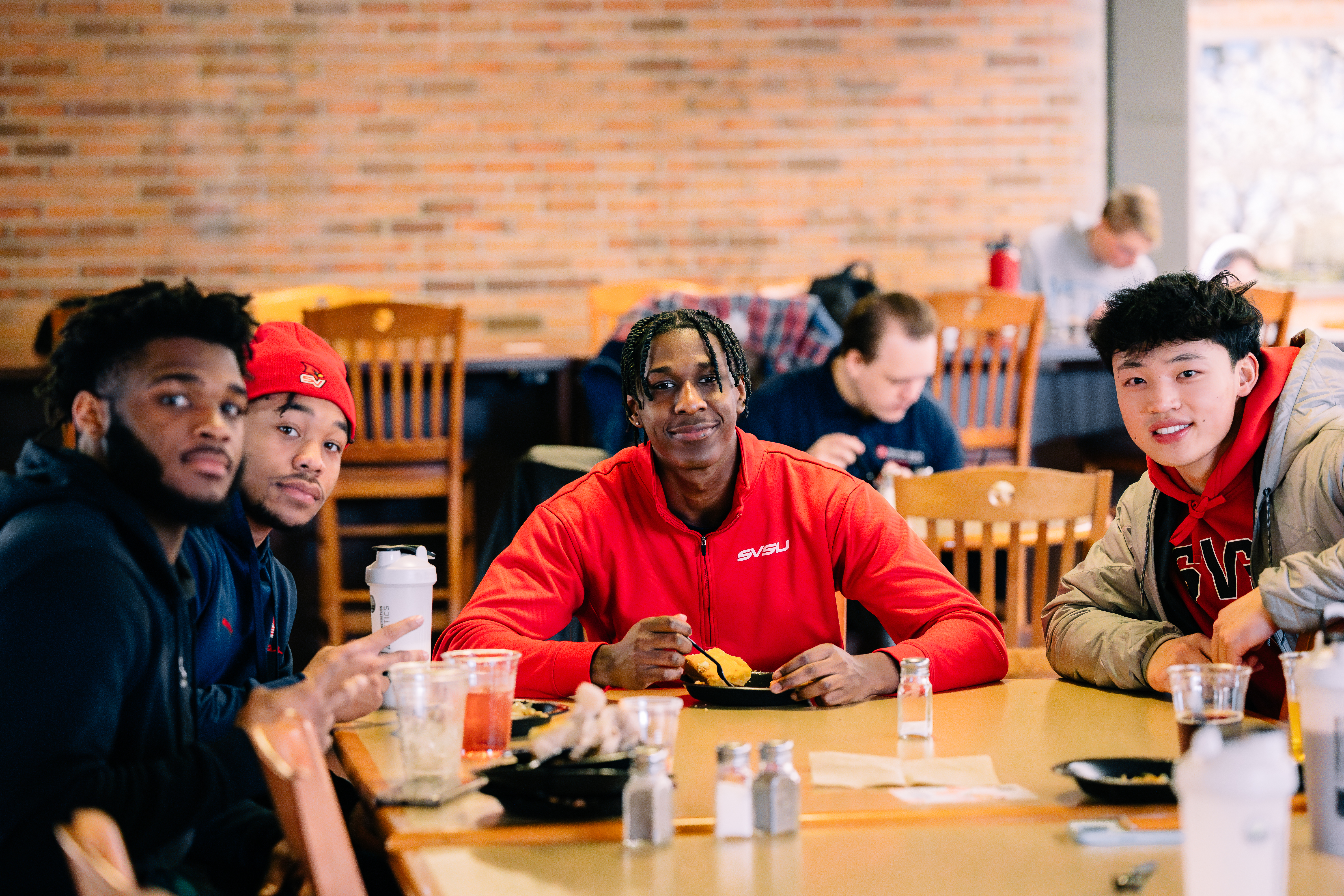 people enjoying a meal at taste of soul